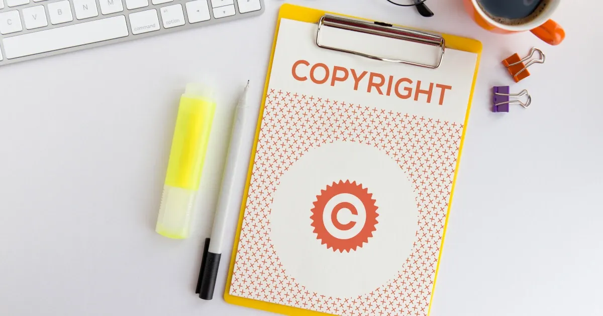 A paper with a copyright symbol on an office clipboard | Swyft Filings